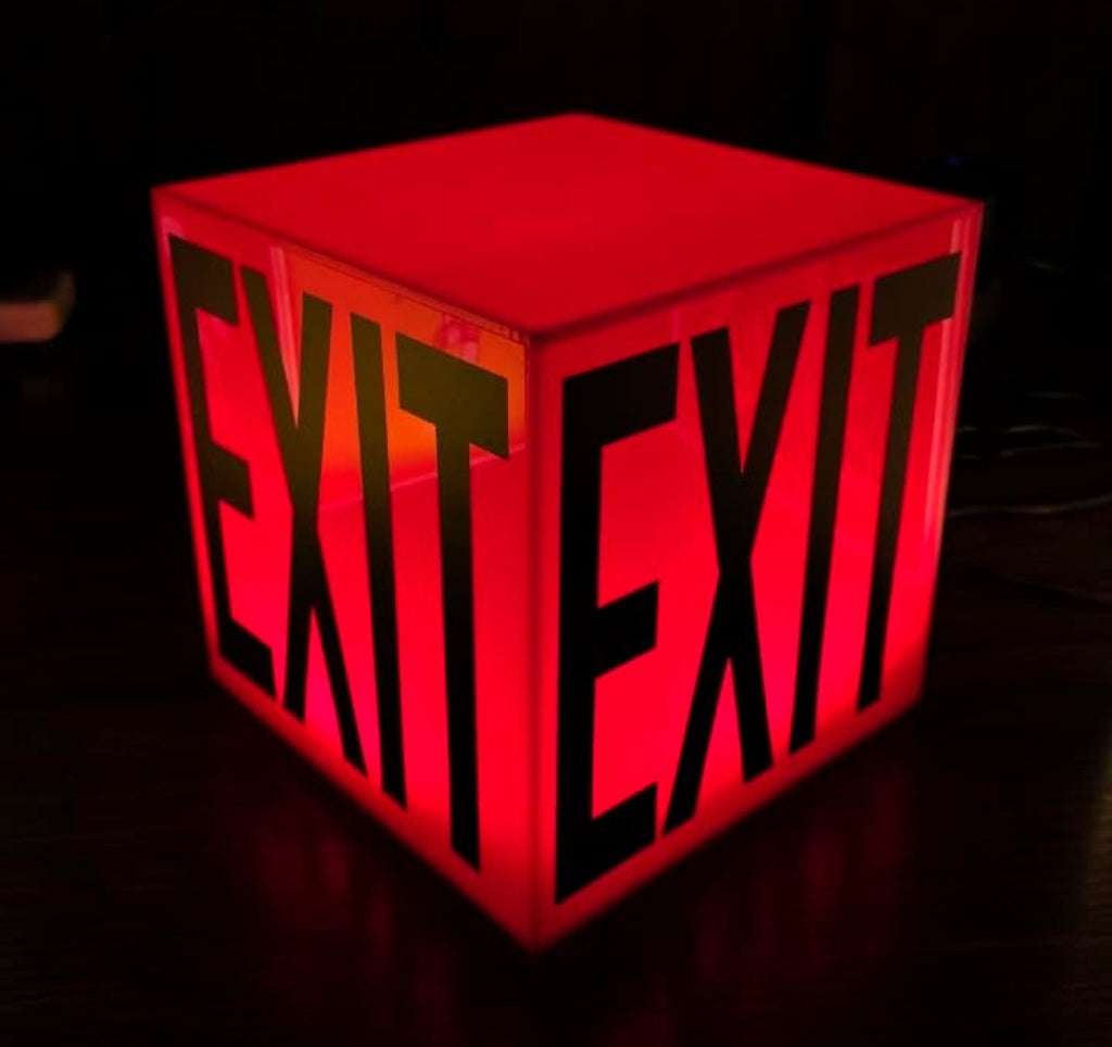 Cube Lamp - EXIT Red - real photo, glowing in a dark room