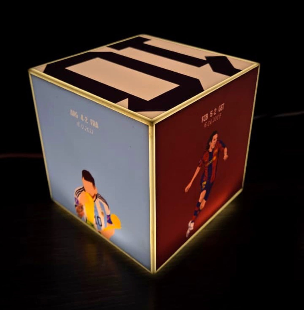 Cube Lamp - Messi - real photo, glowing in a dark room